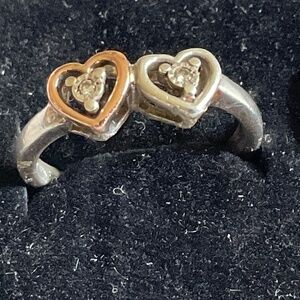 Silver and 10k solid gold ring with two real diamonds.